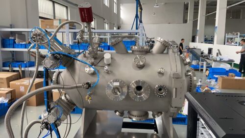 High vacuum test system for light source development and testing